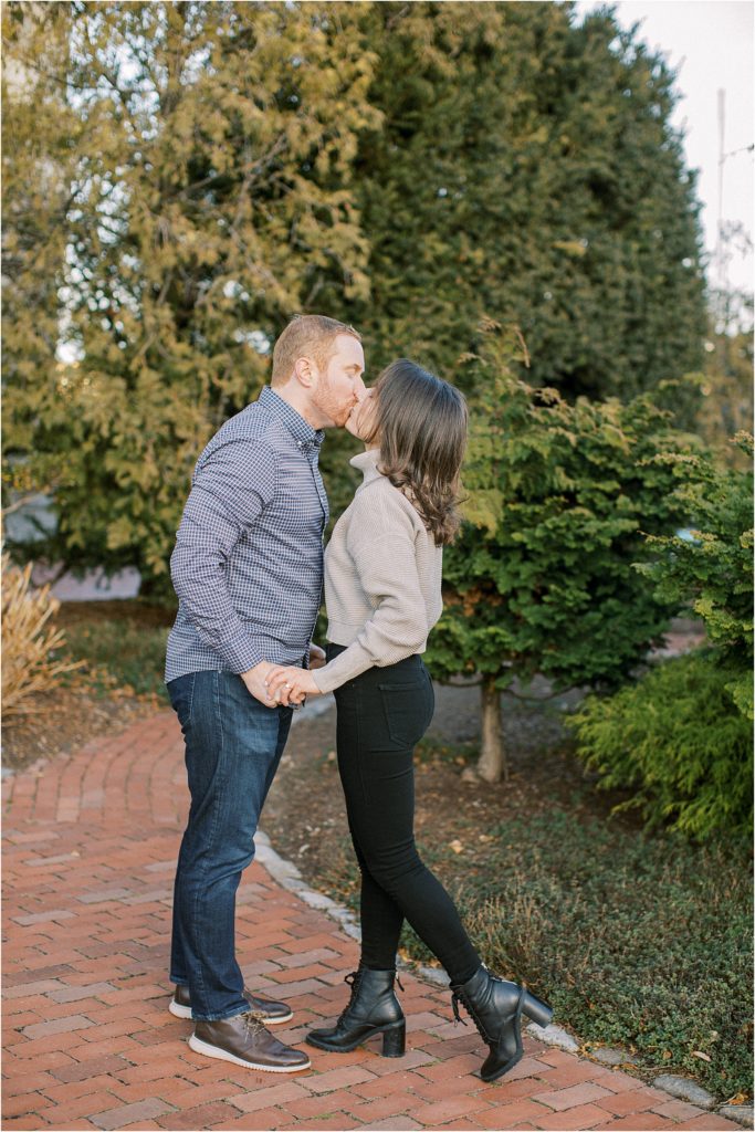 Boston North End engagement session with couple kissing